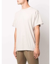 hellbeige T-Shirt mit einem Rundhalsausschnitt von Fear Of God