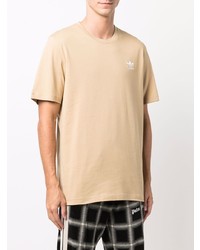 hellbeige T-Shirt mit einem Rundhalsausschnitt von adidas