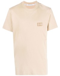 hellbeige T-Shirt mit einem Rundhalsausschnitt von Calvin Klein Jeans