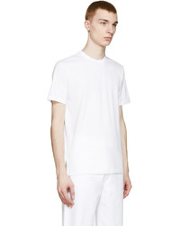 hellbeige T-Shirt mit einem Rundhalsausschnitt von Comme des Garcons