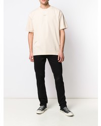 hellbeige T-Shirt mit einem Rundhalsausschnitt von Drôle De Monsieur