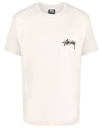 hellbeige T-Shirt mit einem Rundhalsausschnitt von Stussy