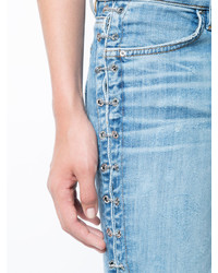hellblaue enge Jeans aus Baumwolle mit Destroyed-Effekten von Amiri