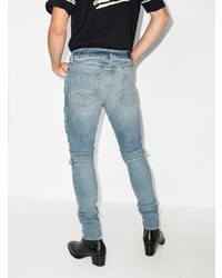 hellblaue bedruckte enge Jeans von Amiri