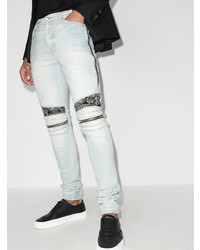 hellblaue bedruckte enge Jeans von Amiri