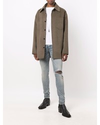 hellblaue bedruckte enge Jeans von Amiri