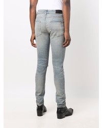 hellblaue bedruckte enge Jeans von Amiri