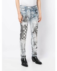 hellblaue bedruckte enge Jeans von Amiri