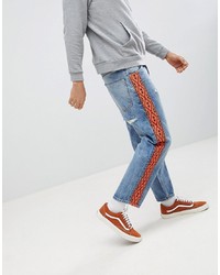 hellblaue bedruckte Jeans von ASOS DESIGN
