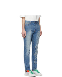 hellblaue bedruckte Jeans von Palm Angels