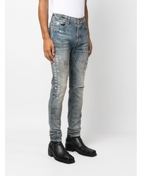 hellblaue bedruckte Jeans von Amiri