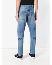 hellblaue bedruckte Jeans von Marcelo Burlon County of Milan