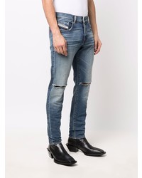 hellblaue enge Jeans mit Destroyed-Effekten von Diesel