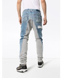 hellblaue enge Jeans mit Destroyed-Effekten von Greg Lauren