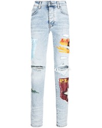 hellblaue enge Jeans mit Destroyed-Effekten von Amiri