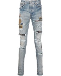 hellblaue enge Jeans mit Destroyed-Effekten von Amiri