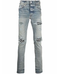 hellblaue enge Jeans mit Destroyed-Effekten von Amiri