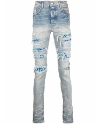 hellblaue enge Jeans mit Destroyed-Effekten von Amiri