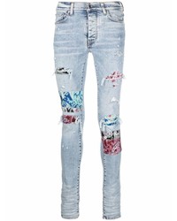 hellblaue enge Jeans mit Destroyed-Effekten von Amiri