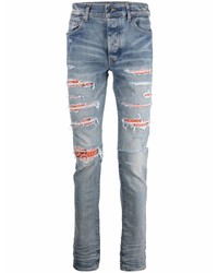 hellblaue enge Jeans mit Destroyed-Effekten von Amiri