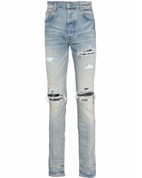 hellblaue enge Jeans mit Destroyed-Effekten von Amiri