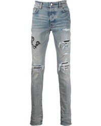 hellblaue enge Jeans mit Destroyed-Effekten von Amiri