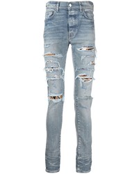 hellblaue enge Jeans mit Destroyed-Effekten von Amiri