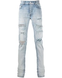 hellblaue enge Jeans mit Destroyed-Effekten von Amiri