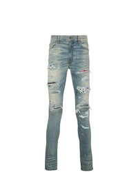 hellblaue enge Jeans mit Destroyed-Effekten von Amiri