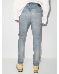 hellblaue enge Jeans mit Destroyed-Effekten von Amiri