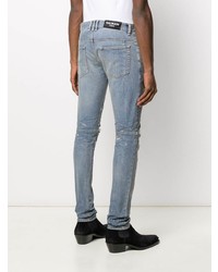 hellblaue enge Jeans mit Destroyed-Effekten von Balmain