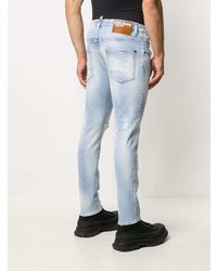 hellblaue enge Jeans mit Destroyed-Effekten von DSQUARED2