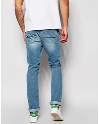 hellblaue enge Jeans mit Destroyed-Effekten von Asos