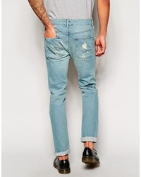 hellblaue enge Jeans mit Destroyed-Effekten von Asos