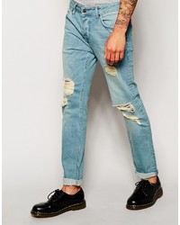 hellblaue enge Jeans mit Destroyed-Effekten von Asos