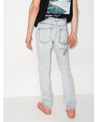 hellblaue enge Jeans mit Destroyed-Effekten von Ksubi