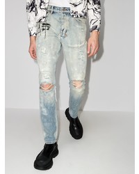 hellblaue enge Jeans mit Destroyed-Effekten von Ksubi