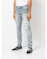 hellblaue enge Jeans mit Destroyed-Effekten von Ksubi