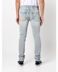 hellblaue enge Jeans mit Destroyed-Effekten von Ksubi