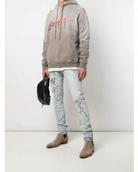 hellblaue enge Jeans mit Destroyed-Effekten von Ksubi