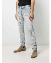 hellblaue enge Jeans mit Destroyed-Effekten von Ksubi