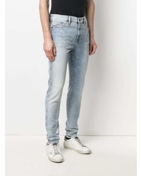 hellblaue enge Jeans mit Destroyed-Effekten von Diesel