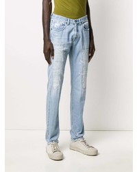 hellblaue enge Jeans mit Destroyed-Effekten von Eleventy
