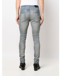 hellblaue enge Jeans mit Destroyed-Effekten von Amiri