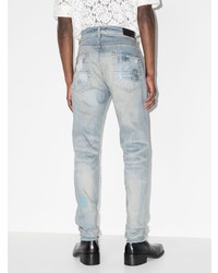 hellblaue enge Jeans mit Destroyed-Effekten von Amiri