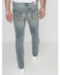 hellblaue enge Jeans mit Destroyed-Effekten von purple brand