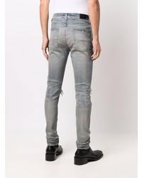 hellblaue enge Jeans mit Destroyed-Effekten von Amiri