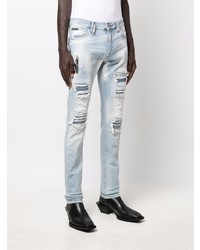 hellblaue enge Jeans mit Destroyed-Effekten von Philipp Plein