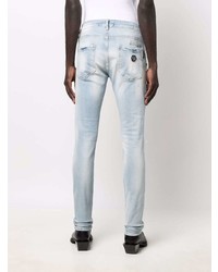 hellblaue enge Jeans mit Destroyed-Effekten von Philipp Plein