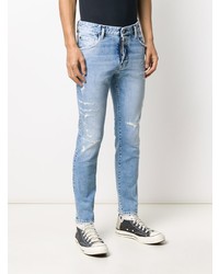 hellblaue enge Jeans mit Destroyed-Effekten von DSQUARED2